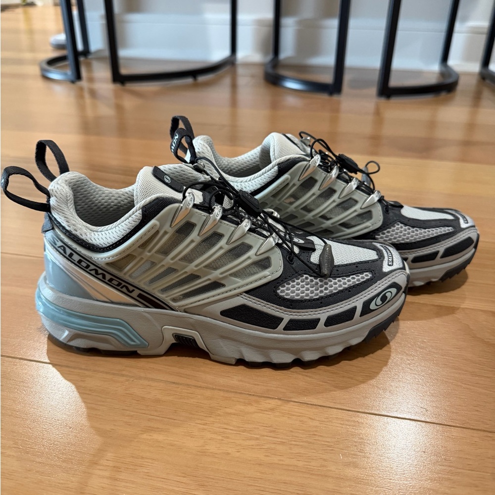 Salomon Trail Runners in Light Gray and Black with Subtle Blue Accents